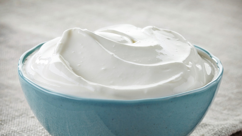 Sour cream in blue bowl