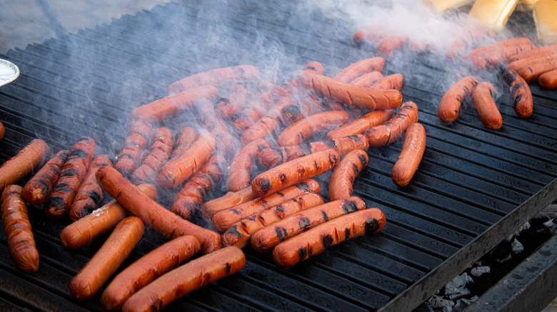 hot dogs on grill