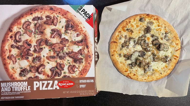 Mushroom pizza and box 