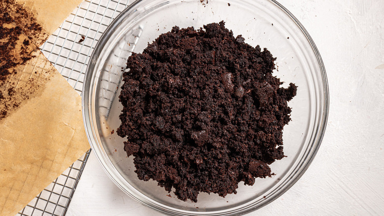 brownie crumbs in clear bowl