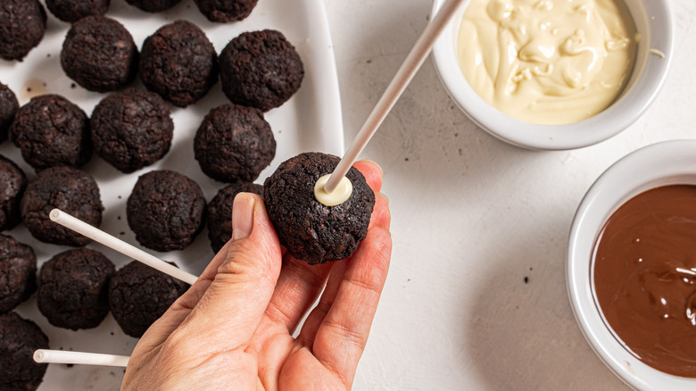 hand holding brownie ball