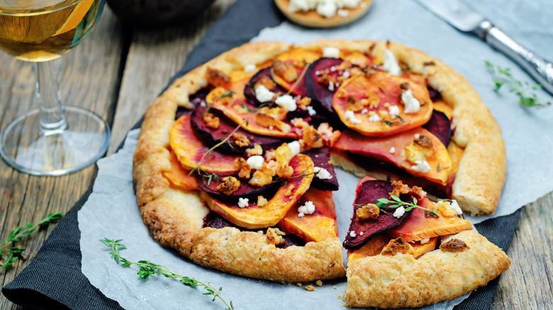 Beet and goat cheese galette on a table