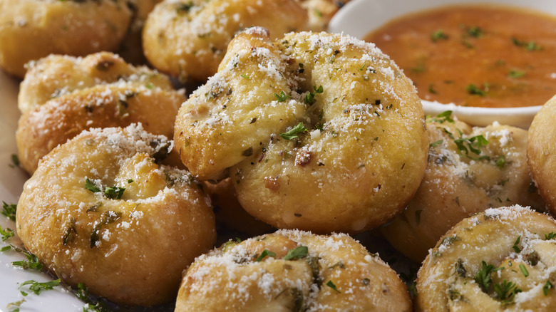 Batch of Parmesan and herb-dusted garlic knots