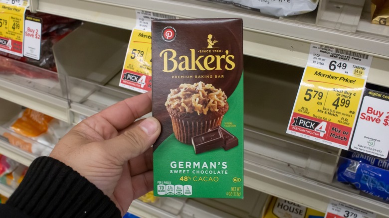 Shopper holding Baker's German Sweet Chocolate bar