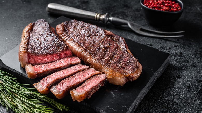 Sliced juicy sirloin steak on a plate