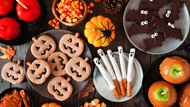 Table spread with halloween desserts