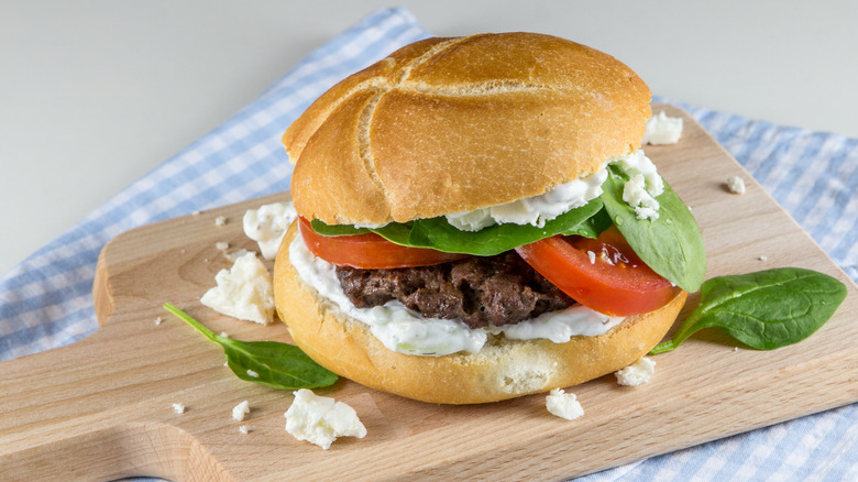 Feta burger on cutting board