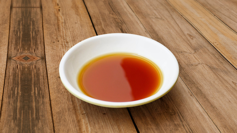 Fish sauce in a white dish