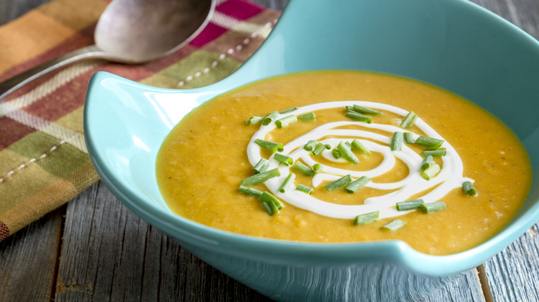 Bowl of butternut squash soup with chives