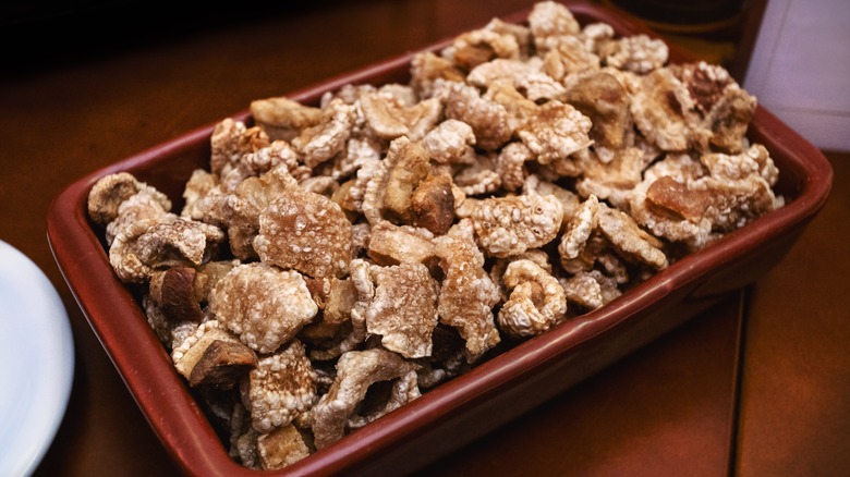 Pork cracklings in a tray