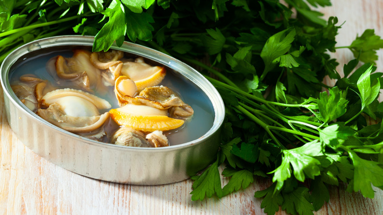 Canned clams in an open container