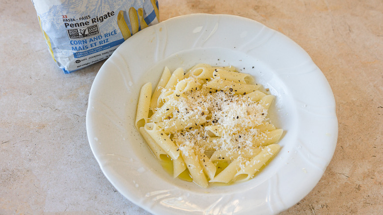 white bowl of penne