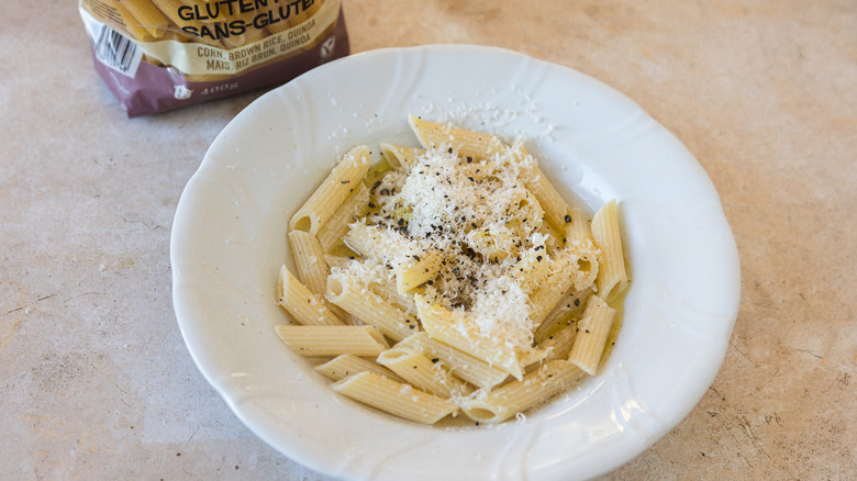 white bowl of penne