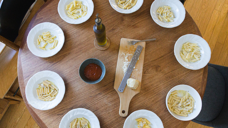 Nine plates of gluten free pasta