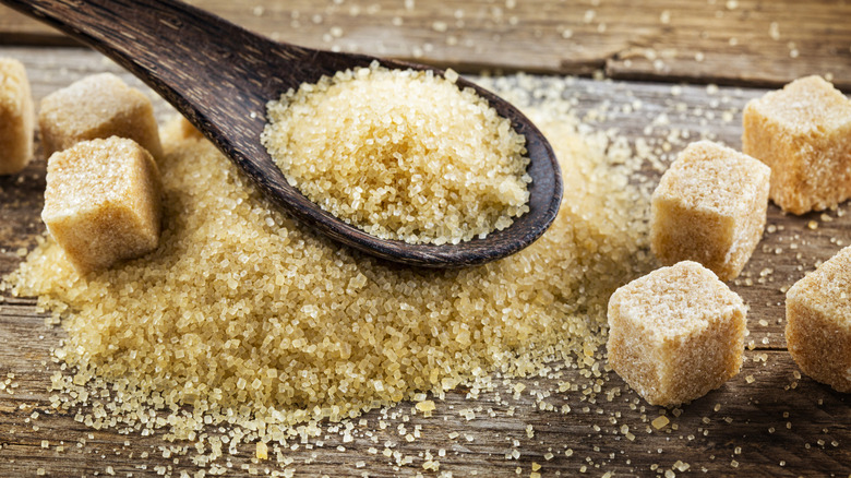 light brown sugar in a wooden spoon