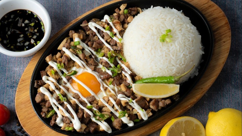 Filipino sisig with rice