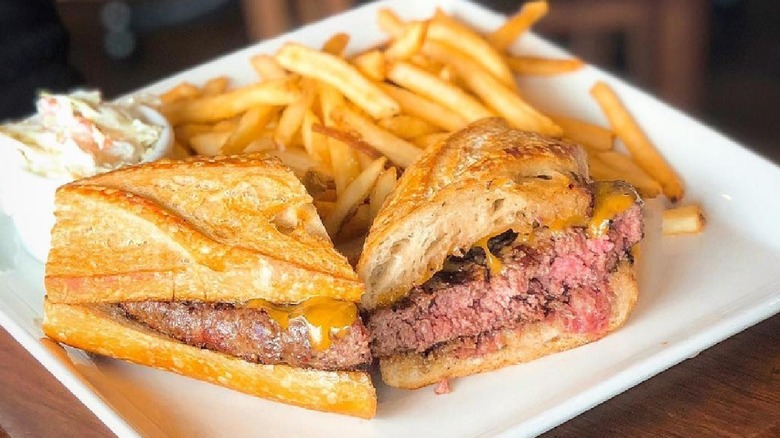 baguette burger served with fries