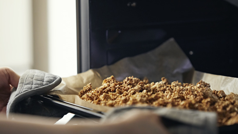 Homemade granola coming from the oven