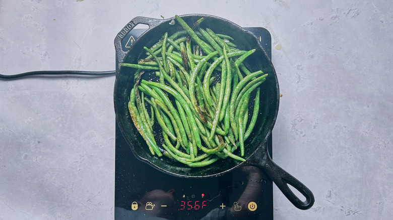seasoned green beans in skillet