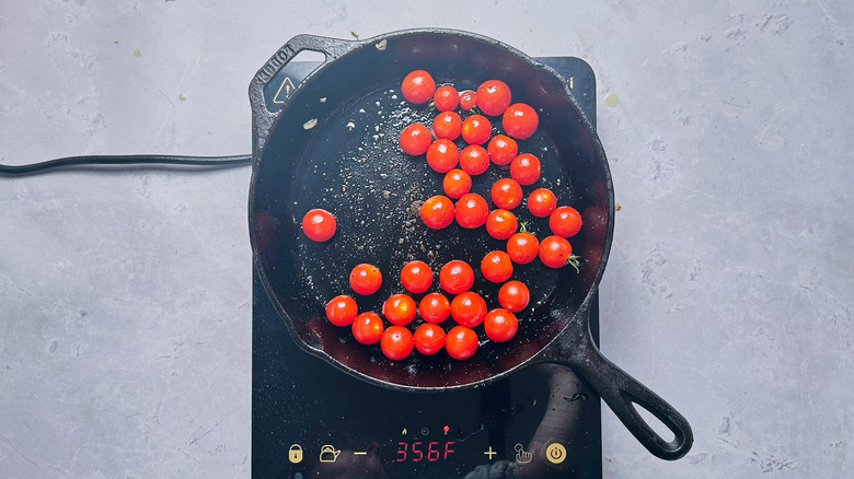 cooking tomatoes in skillet