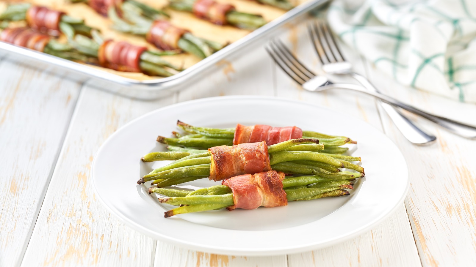 Green beans are much tastier with a belt of caramelized bacon