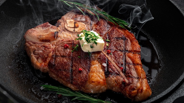 T-bone searing in a pan