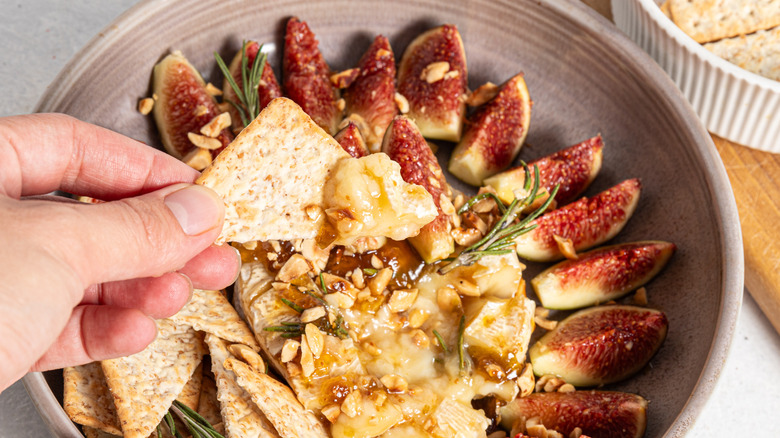 baked brie on cracker with figs