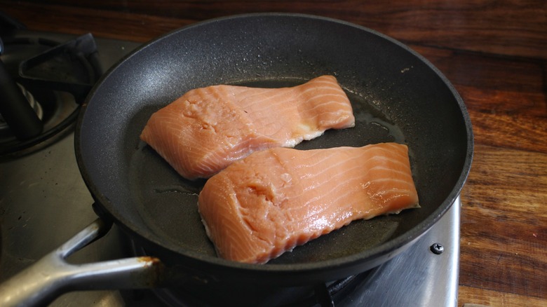 salmon fillets in skillet