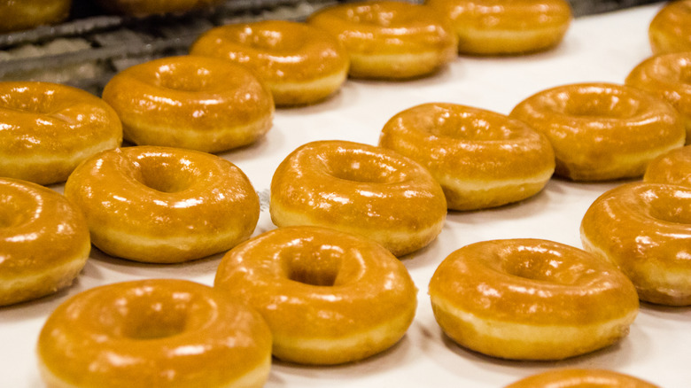 Glazed donuts being made