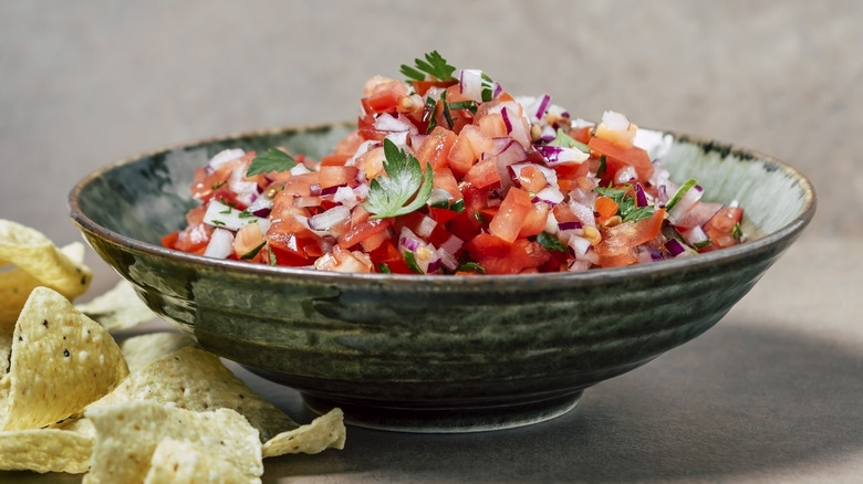 Bowl of fresh salsa with tortilla chips