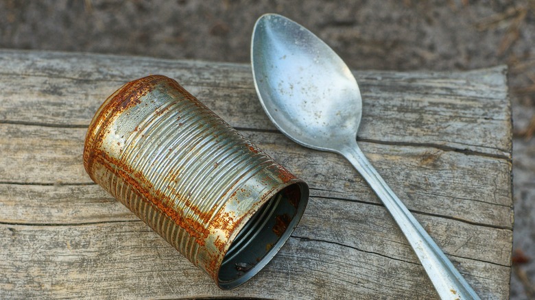 Rusty old can and spoon