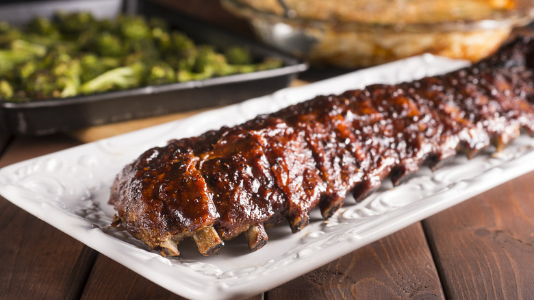 Full rack of ribs on a plate