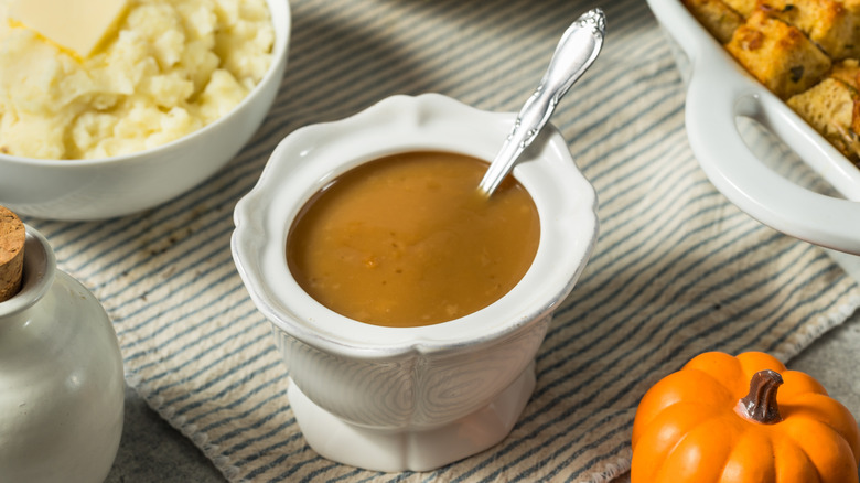 Homemade turkey gravy in a ceramic tureen