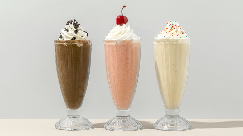 Chocolate, strawberry, and vanilla milkshakes