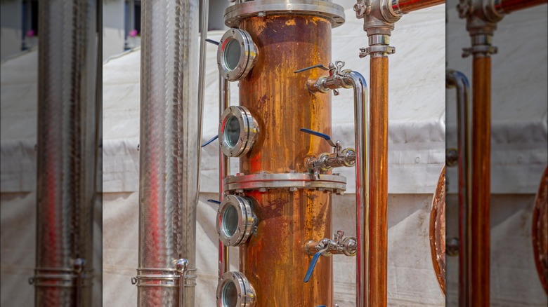 Copper column still in a distillery