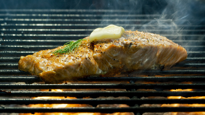 seasoned salmon steak on grill