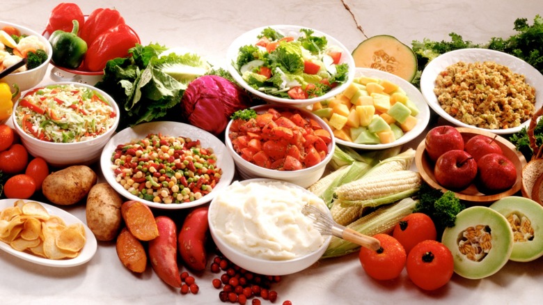 Colorful selection of fresh fruits, vegetables and salads.