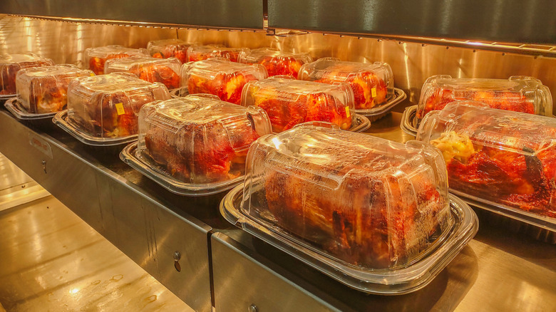 Rotisserie chickens in plastic containers