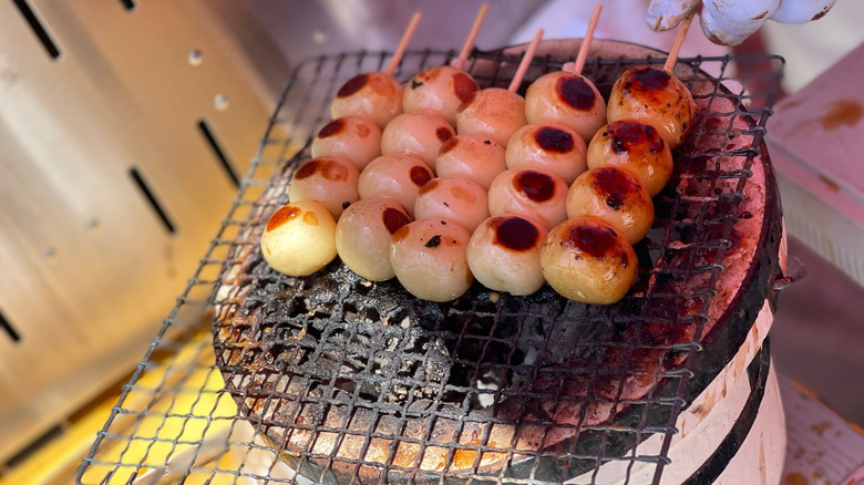 Dumplings cooking on hibachi grill