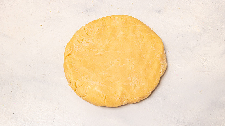 Dough shaped into a disk