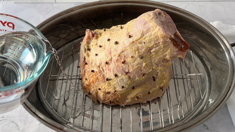 ham in pan with water