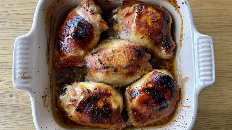 baked chicken in white pan