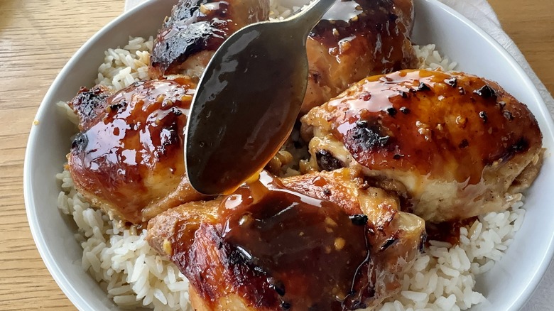 brown-glazed chicken on rice