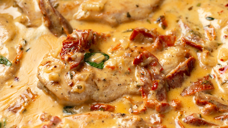 close-up shot of marry me chicken sauce with sun-dried tomatoes