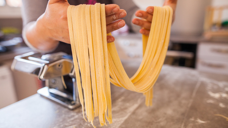 Person making pasta by hand