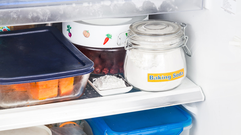 Jar of baking soda in a refrigerator