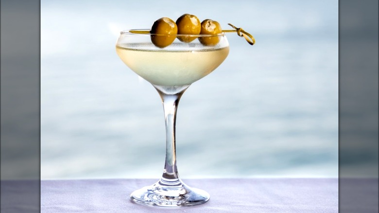 Martini garnished with blue cheese-stuffed olives