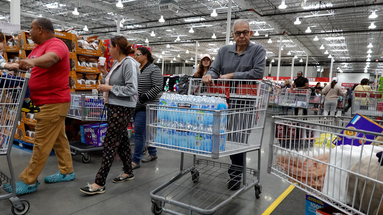 Shoppers with carts at Costco