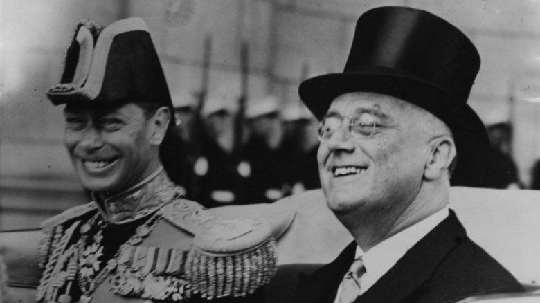 FDR and King George VI riding in a car together.