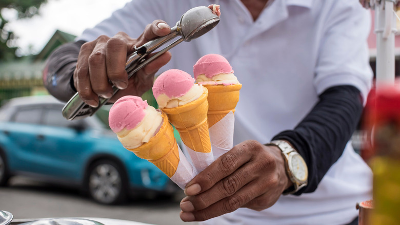 A sorbetero serves scoops of dirty ice cream